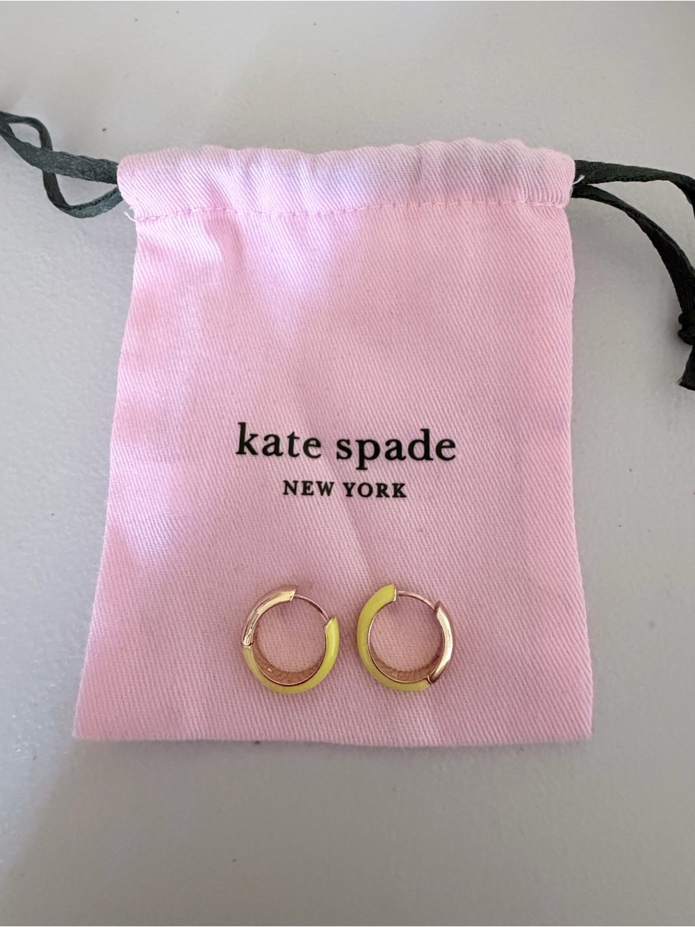 Kate Spade yellow huggie earrings